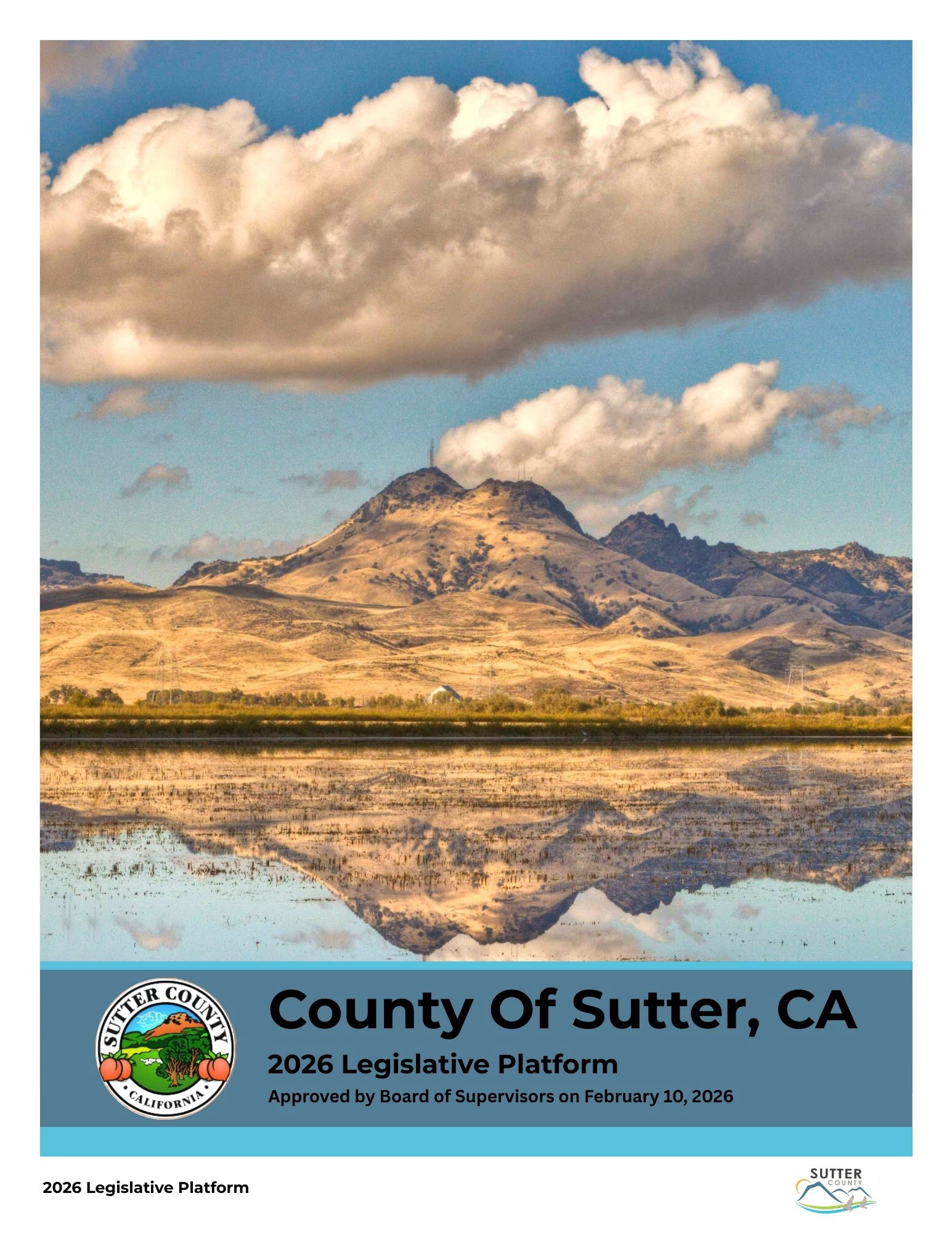 Image of Legislative Platform Cover Page with mountains in the background with clouds hovering over a lake